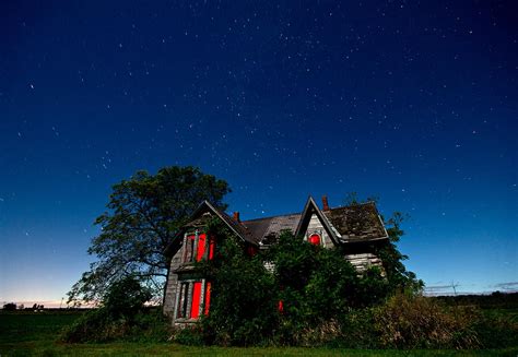 Haunted Farmhouse At Night Photograph by Cale Best