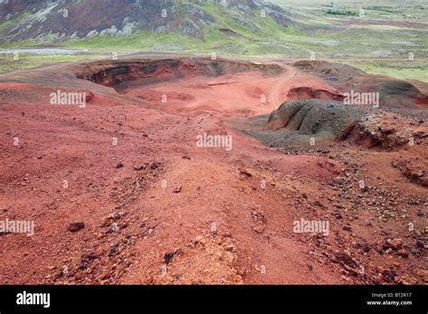 Excavating volcanic Scoria rock from the Seydisholar cone for road ...
