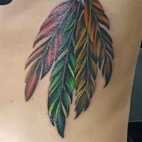 Tattoo uploaded by James Trinka • Chicago Blackhawks feathers on my ...