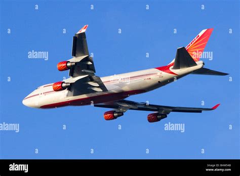 Boeing 747 operated by Air India climbing out from take off at London Heathrow Airport Stock ...