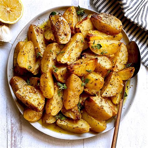 Greek Lemon Potatoes with Garlic & Oregano - The Greek Foodie