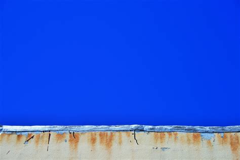 Free Images : sea, ocean, horizon, cloud, sky, building, wall, rust, reflection, blue, weathered ...