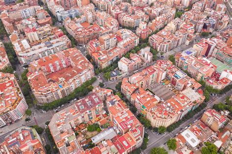 Aerial view above of Barcelona square blocks residential area, Spain ...