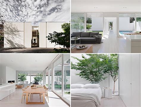 The Minimalist White Exterior Of This Modern House Opens To A Matching White Interior