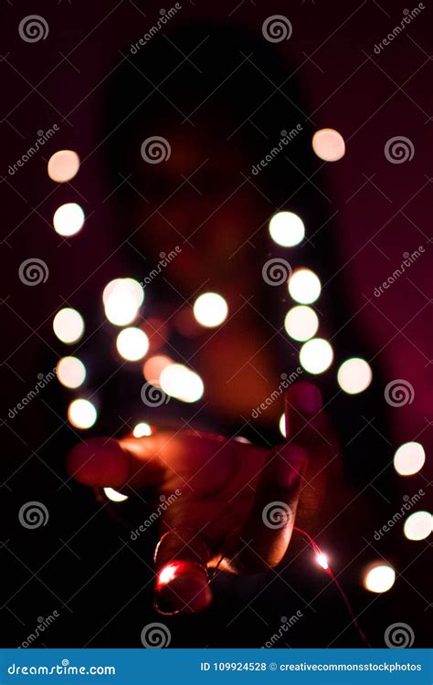 Close-Up Photography Of Hand With Lights Picture. Image: 109924528