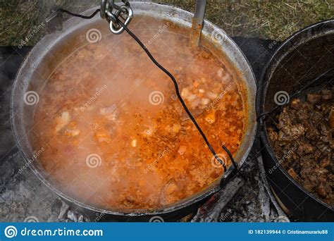 Very Large Cauldron Cooking Food during Campfire. Cooking in a Pot on ...