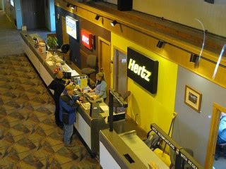 hertz counter | two travelers renting a car at the hertz cou… | Flickr