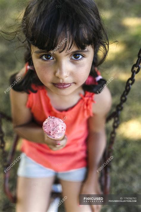 Portrait of little girl with ice cream cone — Casual Clothing ...