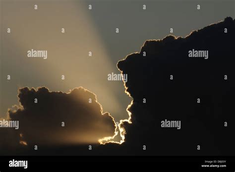 Storm clouds at sunset Stock Photo - Alamy