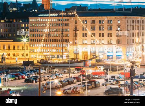 Helsinki, Finland. Evening Night View Of Market Square And Traffic On ...