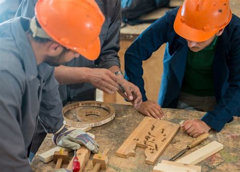 Premium Photo | Craft workers in wood factory