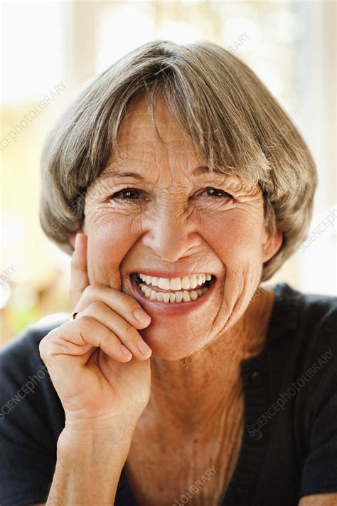 Old woman smiling at viewer - Stock Image - F003/5497 - Science Photo Library