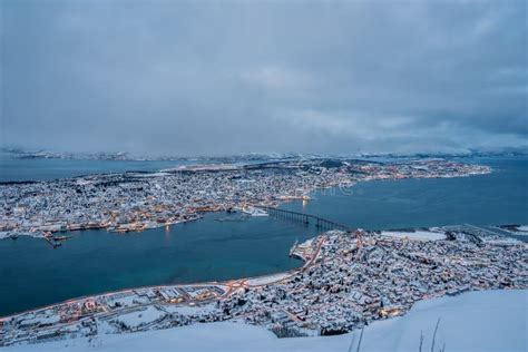 Tromso town in winter stock photo. Image of inlet, dock - 157418564