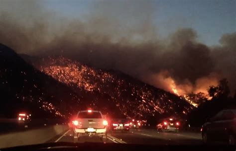 L.A.'s 405 Freeway Shut Down As Wildfire Near Getty Destroys Homes, Prompts Evacuations In Bel ...