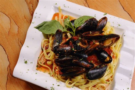 Seafood Mussels in Red Sauce Over Pasta Stock Image - Image of meal, tasty: 6843691