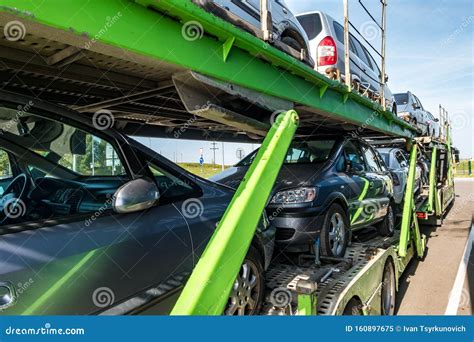 ZELVA, BELARUS - SEPTEMBER 2019: Car Carrier Truck Loaded With Many ...