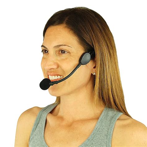 a woman wearing a headset and smiling