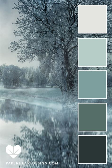 the color scheme is blue and gray, with trees in the background that ...