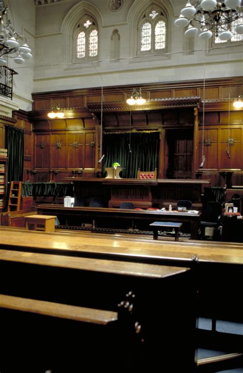 Legal London: London Royal Courts of Justice interior detail of building courtroom, wooden ...