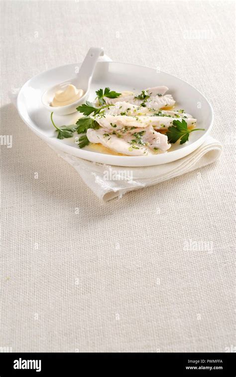 Rose fish fillets with Beurre blanc Stock Photo - Alamy