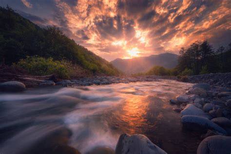 fast mountain river flowing In beautiful sunset time | Beautiful sunset, Sunset, Mountain river