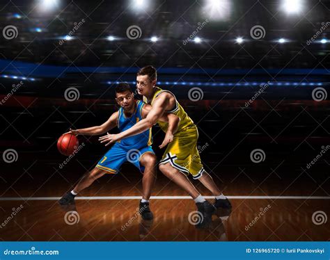 Two Basketball Players in Scrimmage during Basketball Match Stock Photo - Image of competitive ...