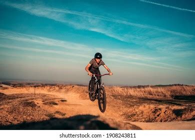 Young Man On Mountain Bike Performing Stock Photo 1908243811 | Shutterstock