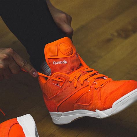 Add some color to your collection with @reebok’s “Solar Orange/White Court Victory Pump ...