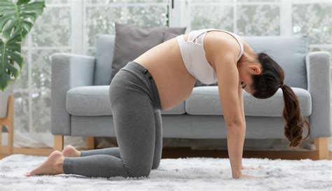 4 Stretches for Lower Back Pain in Pregnancy | Well+Good