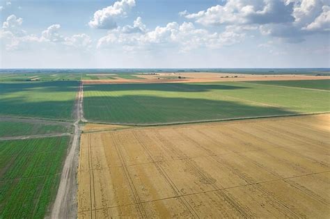 Premium Photo | Aerial view of agricultural fields countryside ...