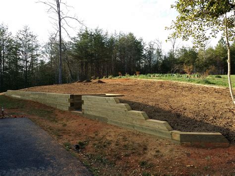 This retaining wall utilizes 6x6 posts with a center indention for ...