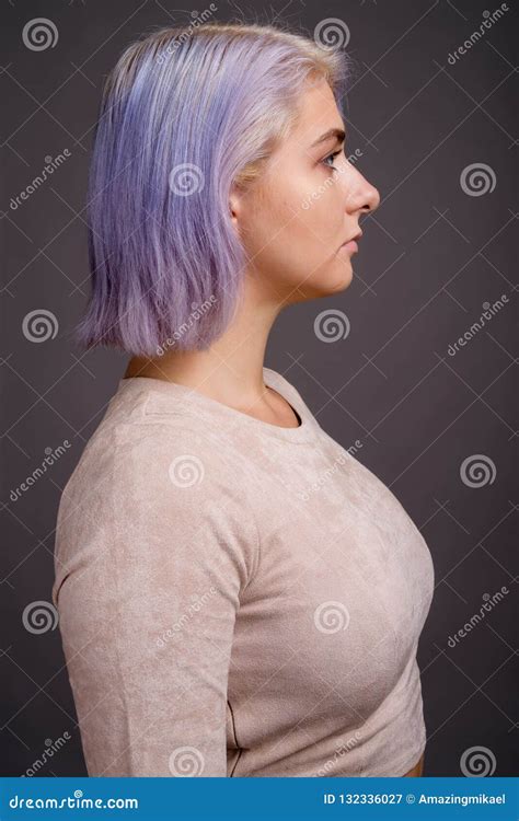 Young Beautiful Rebel Woman With Colorful Hair Against Gray Back Stock Image - Image of profile ...