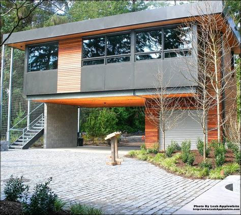 Contemporary Garages | House on stilts, Modern house on stilts, Modern ...