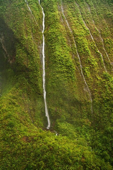 Waterfalls inside crater of Mount Waialeale, Kauai, Hawaii