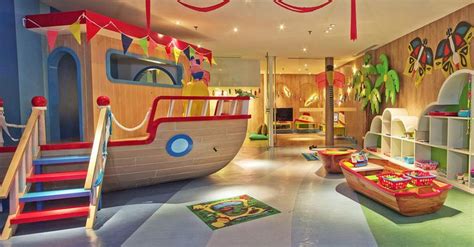 the children's playroom is decorated in bright colors and features an ...