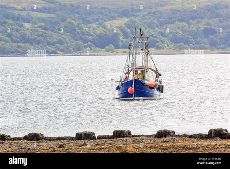 Fishing boat moored on Loch Long Scotland Stock Photo - Alamy