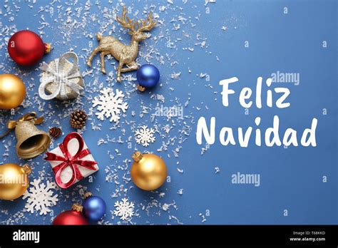 Beautiful Christmas decorations with text FELIZ NAVIDAD on color background Stock Photo - Alamy