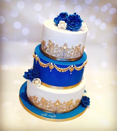 Wedding Cakes Royal Blue And Gold | Royal blue wedding cakes, Wedding cakes blue, Cool wedding cakes