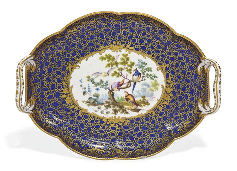 A SEVRES (LATER DECORATED) LOBED TWO-HANDLED TRAY ( PLATEAU 'DU ROI' ) , THE PORCELAIN 18TH ...