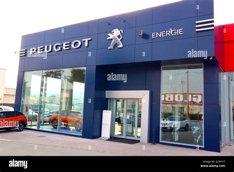 PEUGEOT dealer. Peugeot is a French automobile manufacturer Stock Photo ...