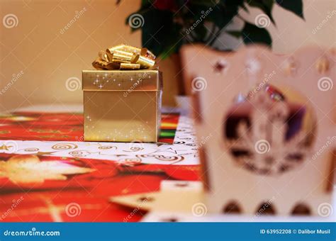 Golden Christmas Gift Box with Surprise Inside Stock Photo - Image of ...