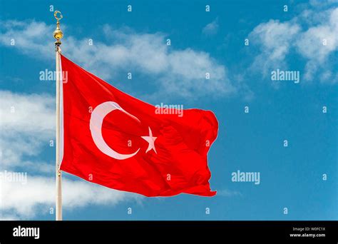 Turkey, Istanbul, flag of Turkey flying in a blue sky Stock Photo - Alamy