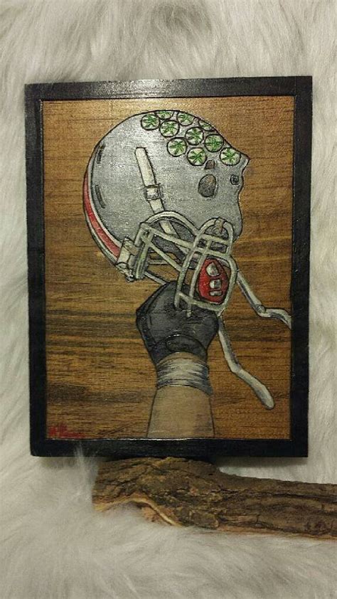 Hand painted Ohio State Buckeyes helmet, raised up in a victory salute. National Champions ...