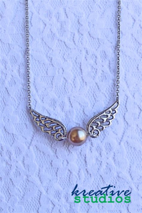 Golden Snitch Necklace - Harry Potter, Quidditch, magic, jewelry | aftcra