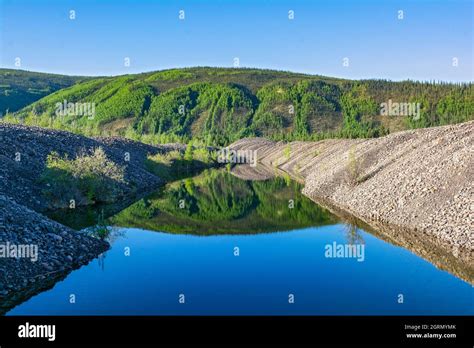 Canada, Yukon Territory, Klondike Region, gold mining dredge tailings Stock Photo - Alamy