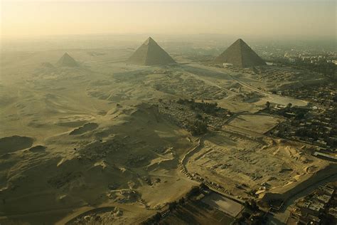 Aerial View Of The Pyramids Of Giza Photograph by Kenneth Garrett