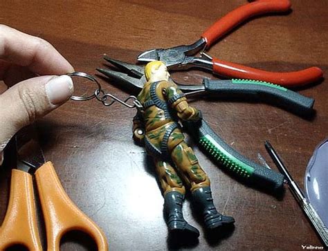Keychain from a broken toy | This GIJoe is broken (not seen … | Flickr