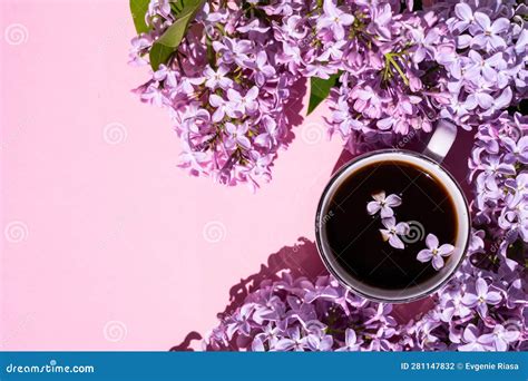 A Cup of Black Coffee on the Table with a Branch of Lilac, Top View. Coffee and Different Lilac ...