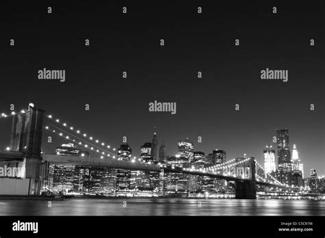 New York City Skyline and Brooklyn Bridge At Night Stock Photo - Alamy