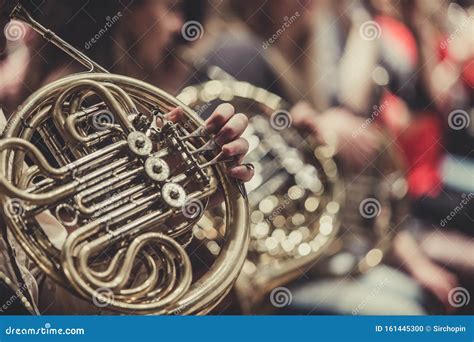 French Horn in the Foreground - Symphony Orchestra - Background - Wallpaper Stock Photo - Image ...